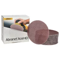Box of Mirka Abranet Ace HD sanding discs with a stack of circular abrasive discs beside it.
