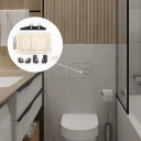 Small modern bathroom with wooden wall panels, a white toilet, a gray vanity with sink on the left, and a glass-enclosed shower on the right.