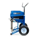 NOWOŚĆ !! GRACO Agregat malarsko-szpachlarski Mark XV XT Standard (18H403) Blue portable machine mounted on a wheeled cart with a handle, likely a cart-mounted paint sprayer or similar material applicator.