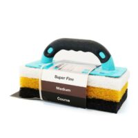Multi-layer cleaning sponge with a blue handle and a tag listing Super Fine, Medium, and Course.