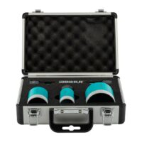 Open metal carrying case with black foam insert and turquoise tool attachments arranged in foam slots, ready for transport or storage.