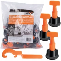 Bag of reusable tile leveling system components with orange wedges and black bases.