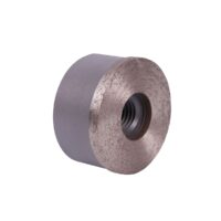 DISTAR Frez diamentowy DGW-S 49/M14 Hard Ceramics 100 (17483522216) Close-up of a circular grinding wheel with a rough abrasive rim and a central hole, viewed at an angle.