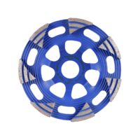 DISTAR Frez diamentowy DGS-W 125 Raptor (16915480010) Blue circular diamond grinding wheel with segmented abrasive segments around the rim and cutout holes in the center, used for cutting and grinding materials around edges.