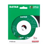 Distar 125 mm polishing/grinding disc in green packaging with white core visible through the center hole, '30 Years of Success' label nearby.