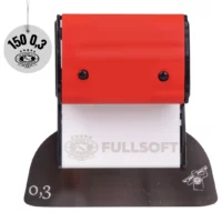 OLEJNIK Szpachla powierzchniowa nóż pióro do gładzi FULLSOFT 150MM OSTRZE NIERDZEWNE WYMIENNE 0,3MM OKRĄGŁE ROGI (1239150G3FS) Red, hand-operated self-inking stamp on a black base with a white pad beneath; corner shows '0,3' and a small icon.