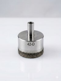 EdPlit OTWORNICA 42 mm (E90021) Metal grinding/abrasive tool: cylindrical shank atop a round metal body, with a textured abrasive base marked 42-D.