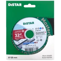 DISTAR Limitowana tarcza diamentowa do ceramiki i szkła 125×22.23mm 1A1R MasterCut (87015424122) Distar MasterCUT LE ceramic tile cutting disc in green packaging, price tag 32 zł, visible barcode.